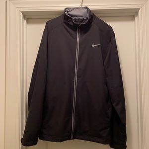 Black men’s Nike medium full zip golf rain jacket.